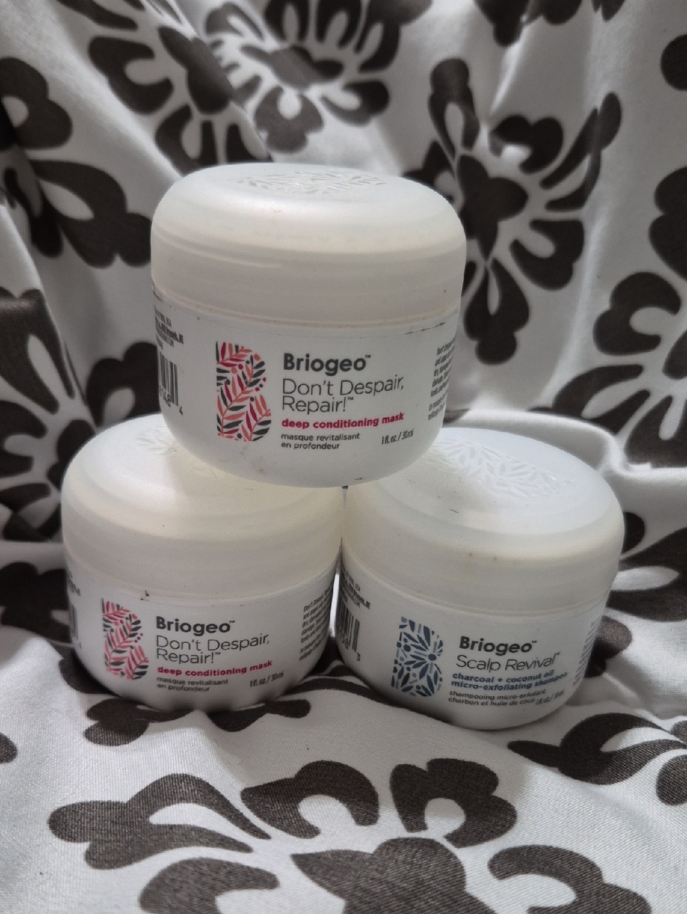 Briogeo white mini hair treatment jars with patterned labels